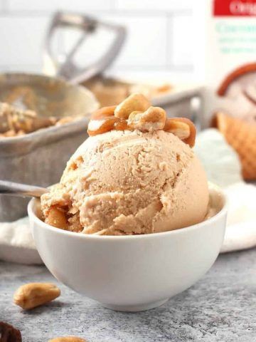 Salted caramel ice cream in a small white bowl