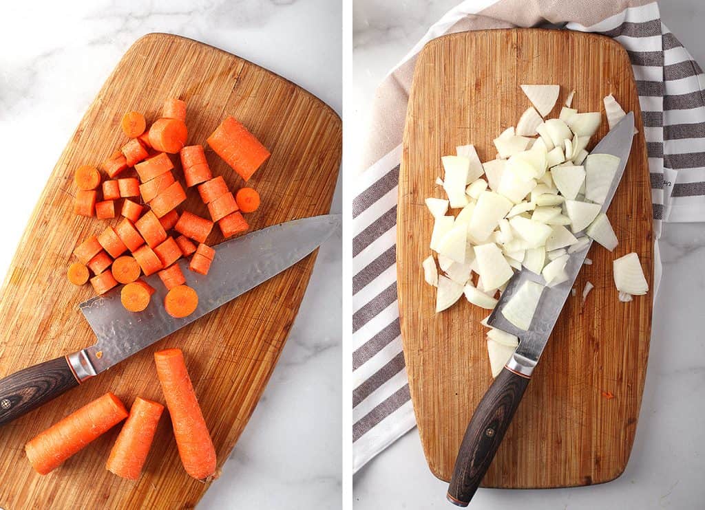 Chopped carrots and onion on a cutting board