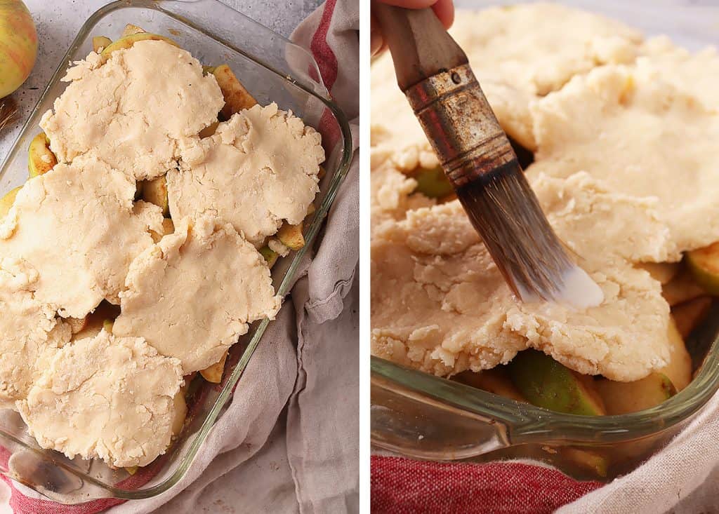 Unbaked apple cobbler in a glass casserole dish