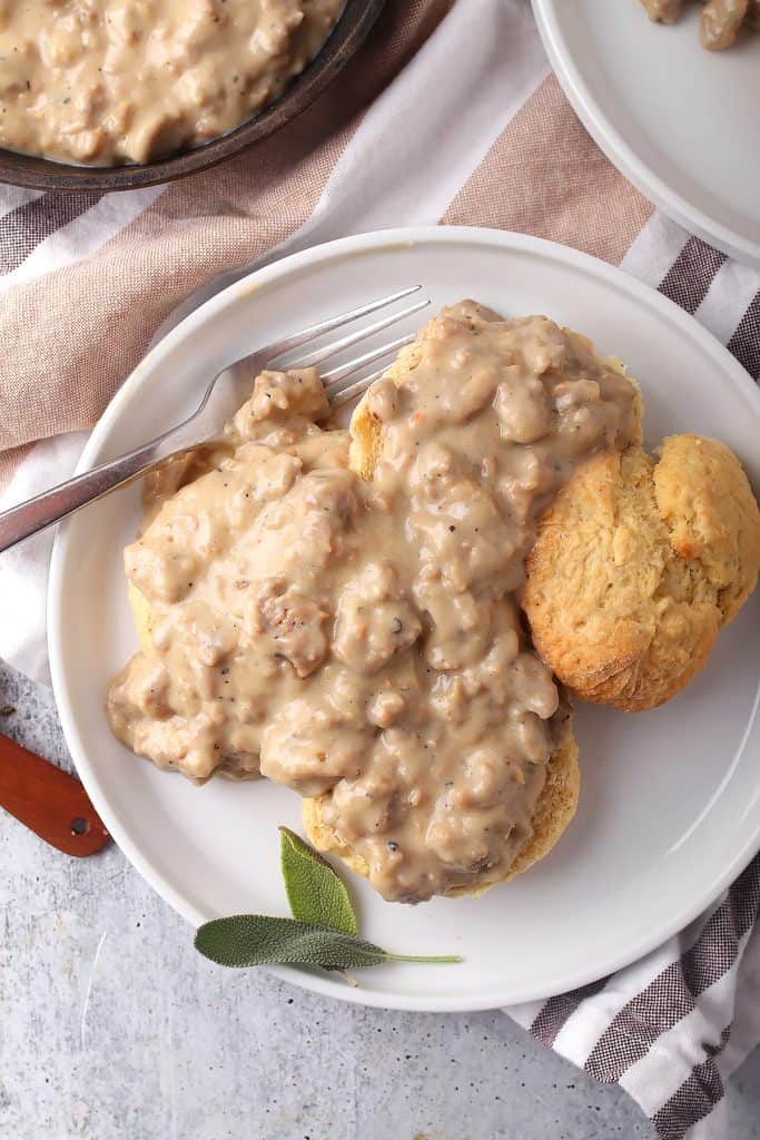 Finished biscuits and gravy on a white plate