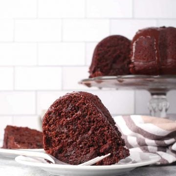 Slice of vegan bundt cake on a white plate