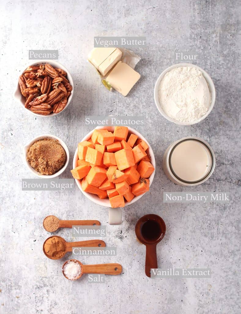 Measured ingredients for sweet potato casserole on a concrete countertop