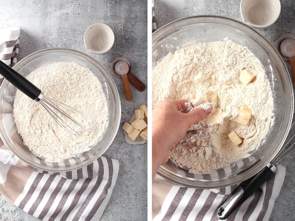 Dry ingredients with cubes of butter in a glass bowl