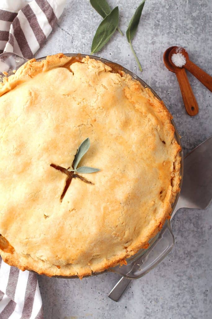 Whole finished pot pie with fresh sage