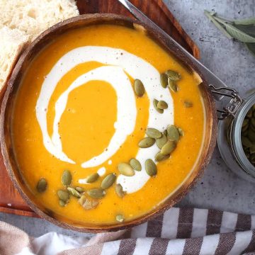 Finished butternut squash soup in a coconut bowl