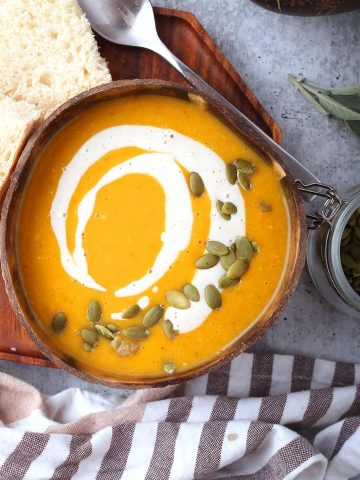 Finished butternut squash soup in a coconut bowl