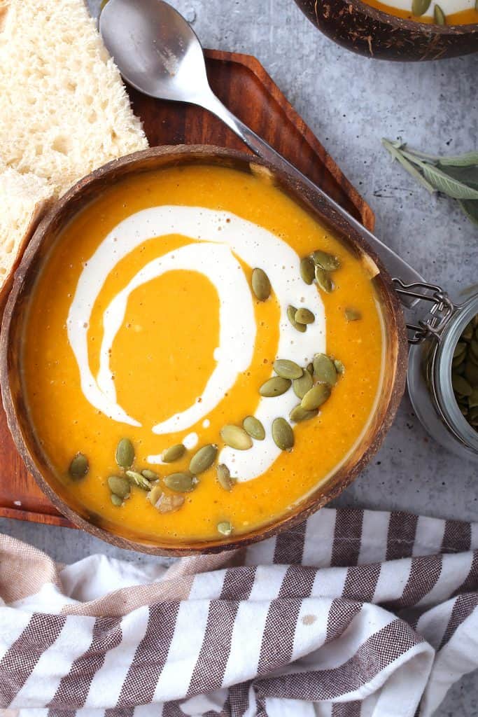 Finished butternut squash soup in a coconut bowl