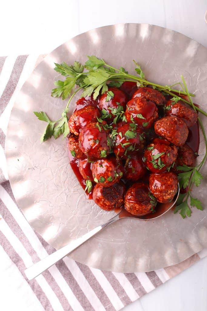 Plate of vegan meatballs on a silver platter