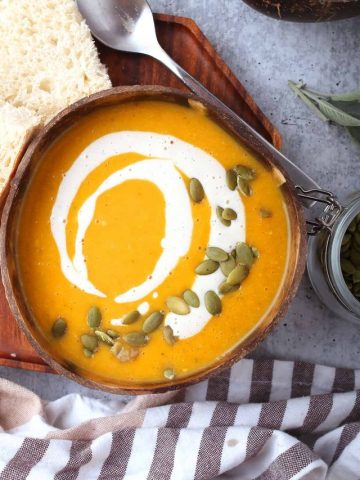 Finished butternut squash soup in a coconut bowl
