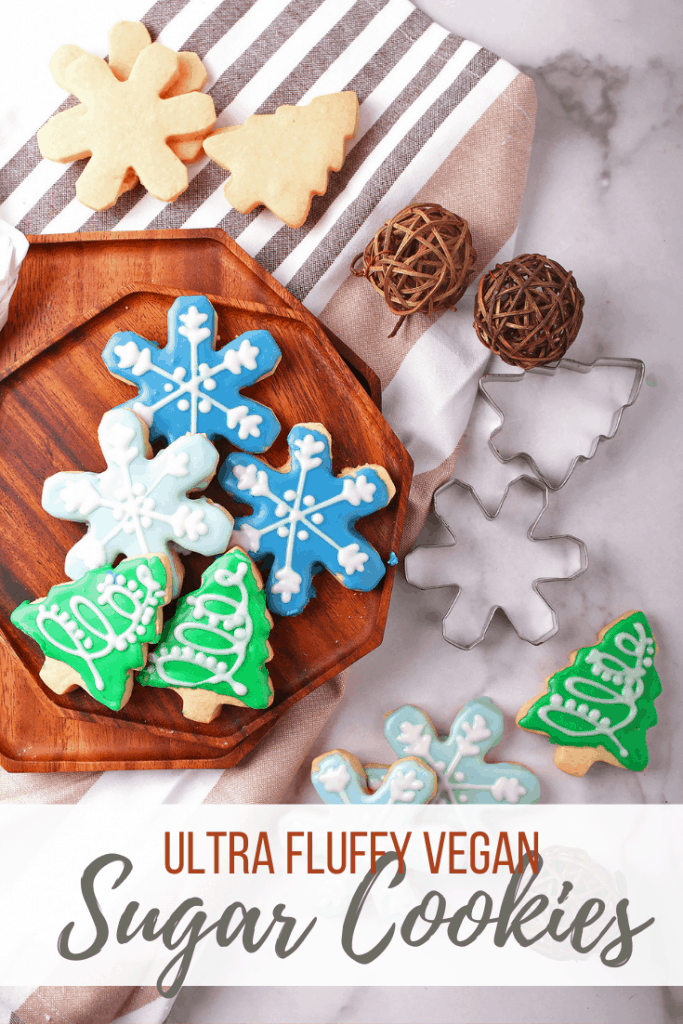 You're going to love these vegan sugar cookies! They are soft, buttery, fluffy, and topped with the perfect royal frosting. This easy cookie recipe makes a delicious holiday treat that you can enjoy year 'round!