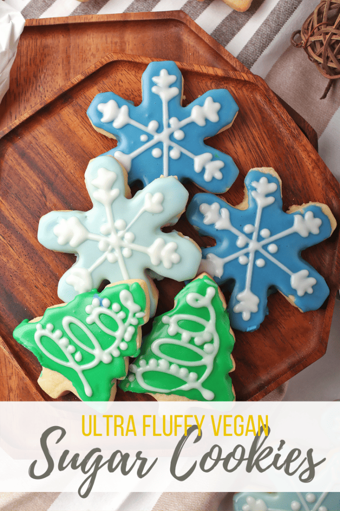 You're going to love these vegan sugar cookies! They are soft, buttery, fluffy, and topped with the perfect royal frosting. This easy cookie recipe makes a delicious holiday treat that you can enjoy year 'round!