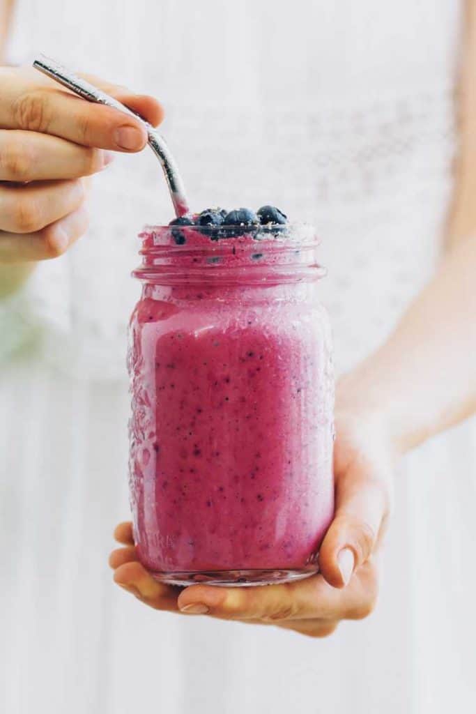Strawberry and Blueberry smoothie in a mason jar