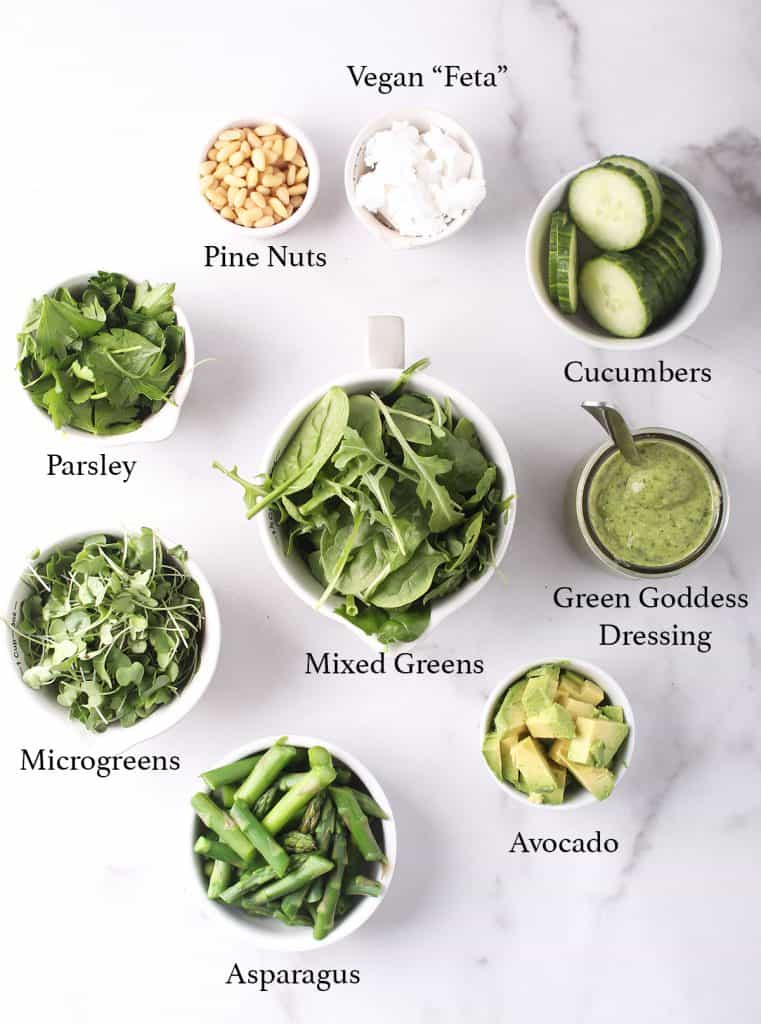 Ingredients for Green Goddess dressing on a marble countertop