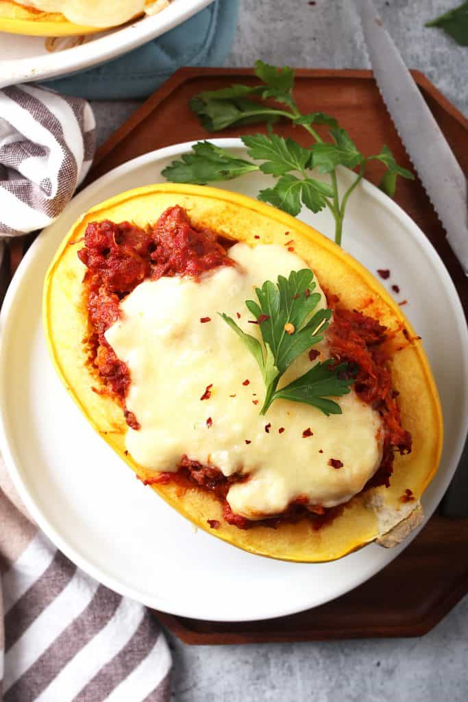 Finished spaghetti squash topped with melty white cheese