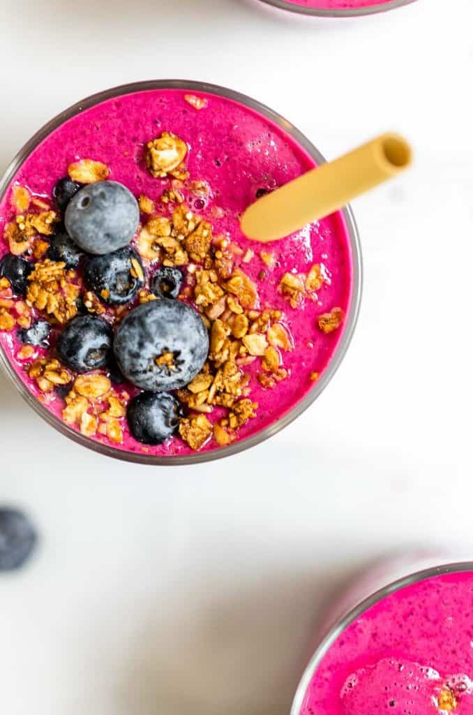 Overhead shot of beet smoothie with fresh blueberries