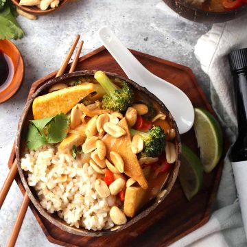 Bowl of red Thai curry served over rice.