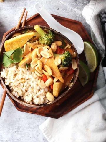 Bowl of red Thai curry served over rice.
