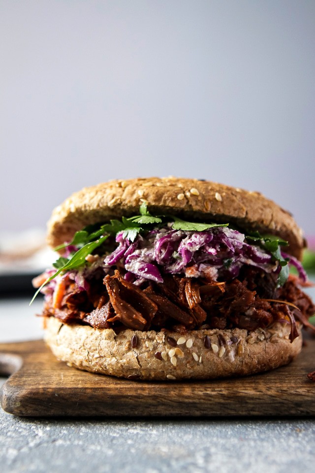 Vegan Pulled Jackfruit Sandwich on a wooden cutting board