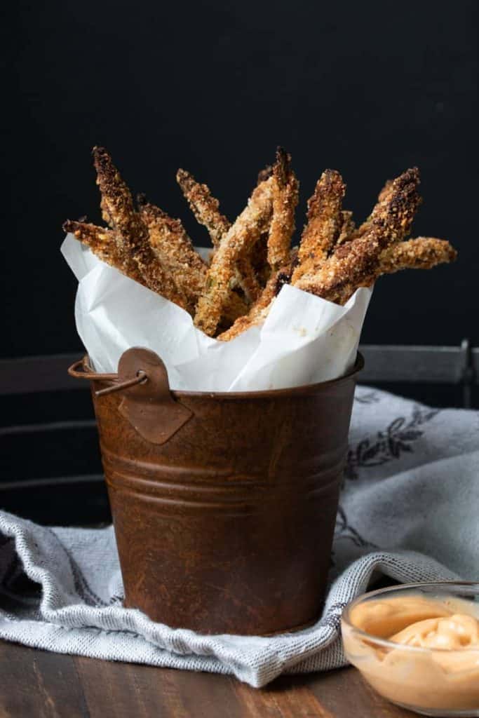 Basket of breaded asparagus fries 