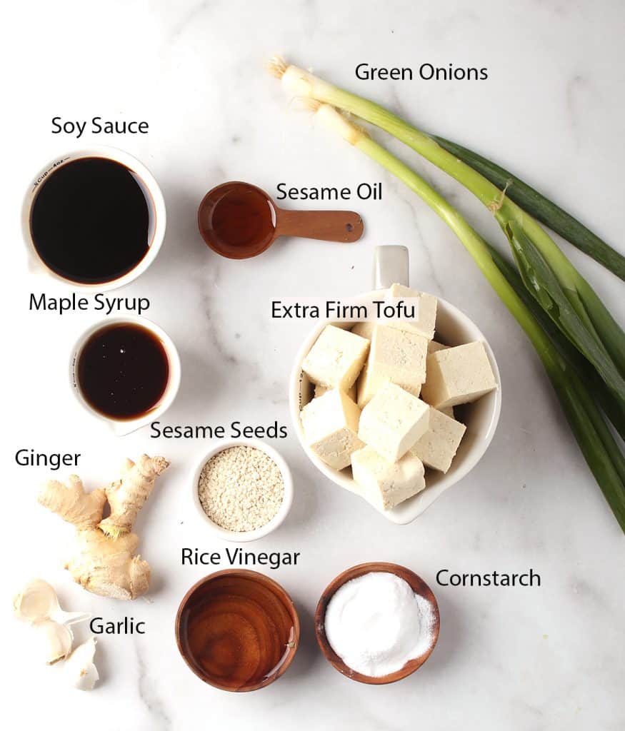 ingredients for vegan teriyaki tofu recipe laid out on a white tabletop