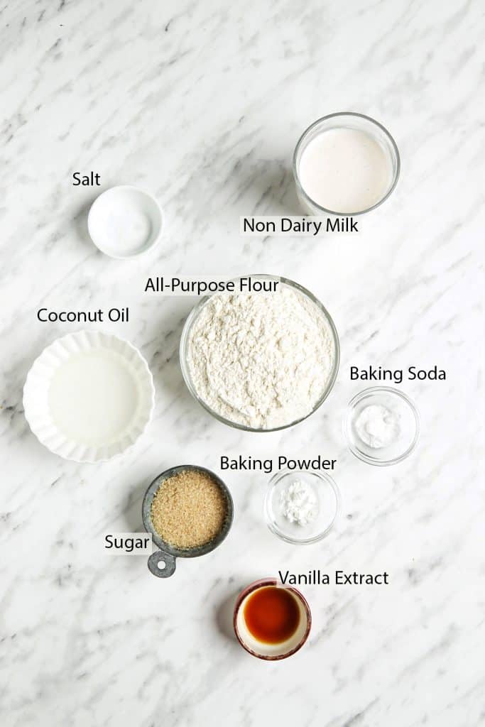 Classic vegan waffle ingredients: all-purpose flour, non-dairy milk, coconut oil, salt, baking soda, baking powder, sugar and vanilla extract