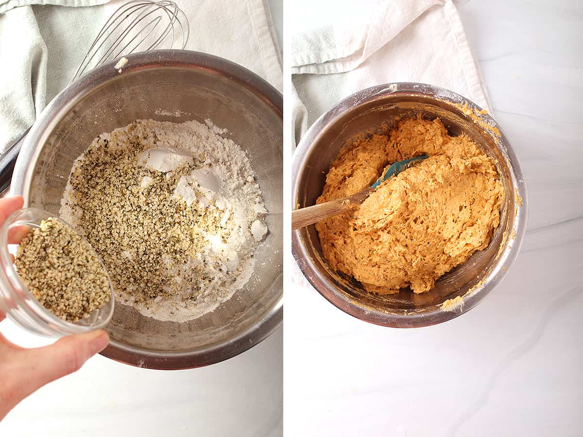 Pumpkin batter mixed together in a metal mixing bowl with a rubber spatula. 