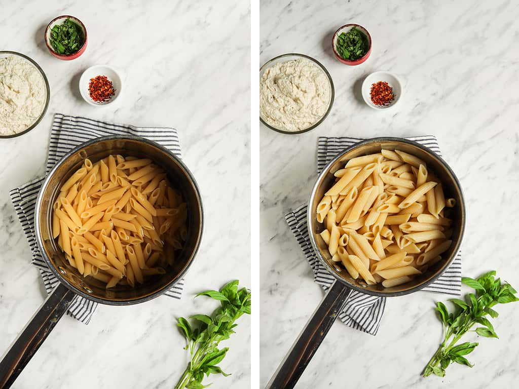 one saucepan filled with water and penne pasta ready to boil for baked ziti. ricotta cheese, basil, and red pepper flakes above the saucepan with basil to the side