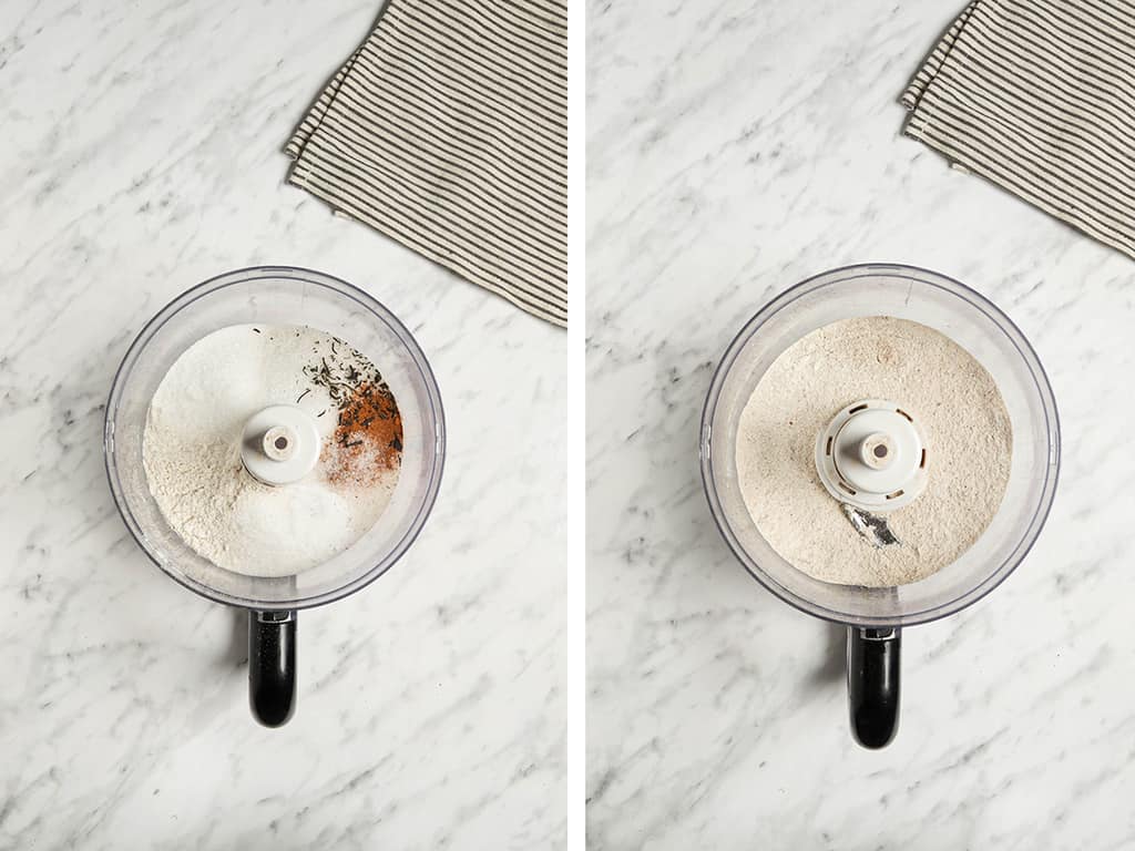 flour, baking soda and powder, salt, cinnamon, allspice, clove, ginger, nutmeg, and black tea in food processor on white surface