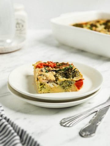 one slice of vegan breakfast casserole on white plate