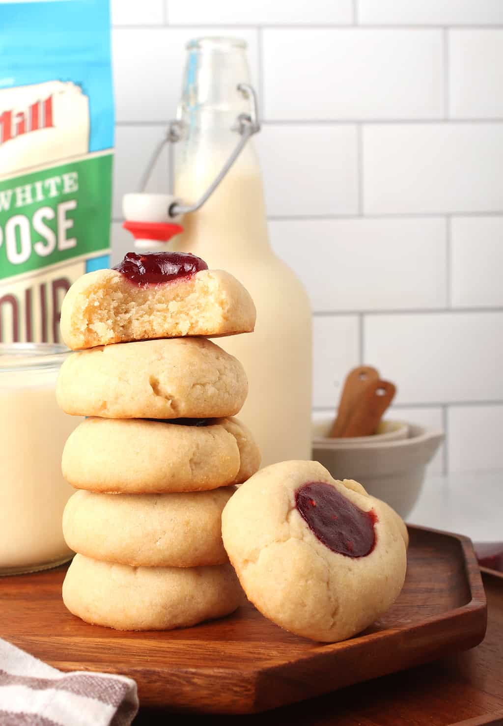 Stack of vegan cookies on a hexagon wooden platter