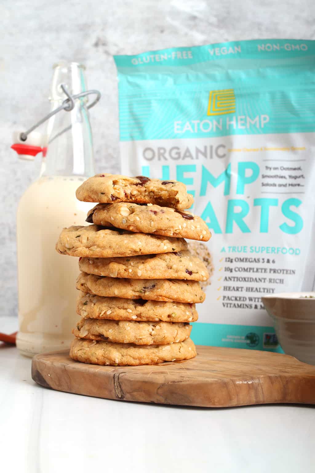 Stack of finished cookies with a bite taken out of the top one. 