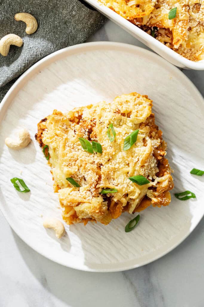 top view of baked buffalo cauliflower pasta with homemade buffalo cream sauce and crispy topping