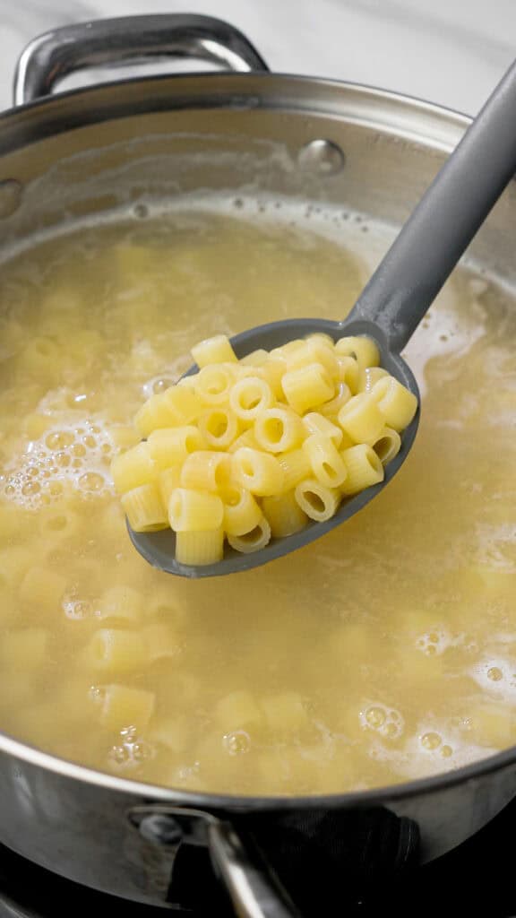 cooking ditalini pasta to a perfect al dente in a pot full of salted water