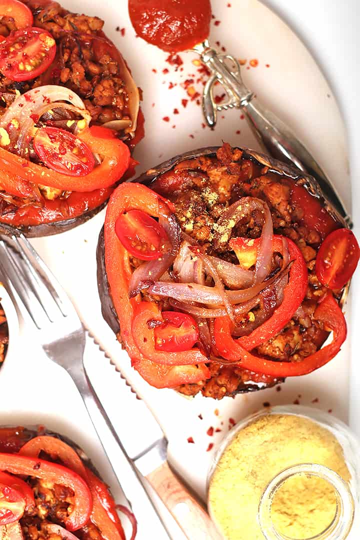 Portobello pizzas with sautéed onions and peppers