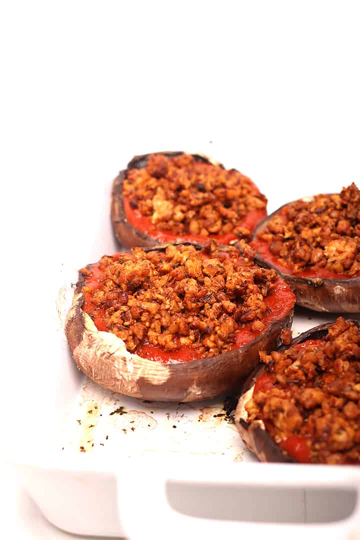 Tempeh sausage stuffed portobellos