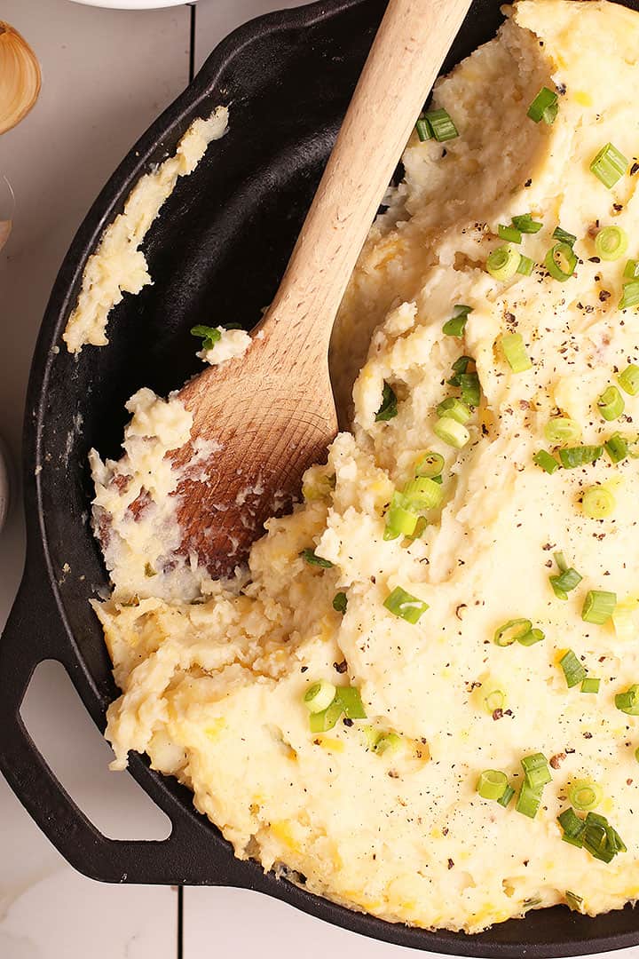 Vegan mashed potatoes in cast-iron skillet