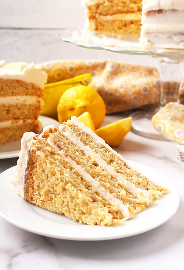 Slice of lemon cake on a white plate