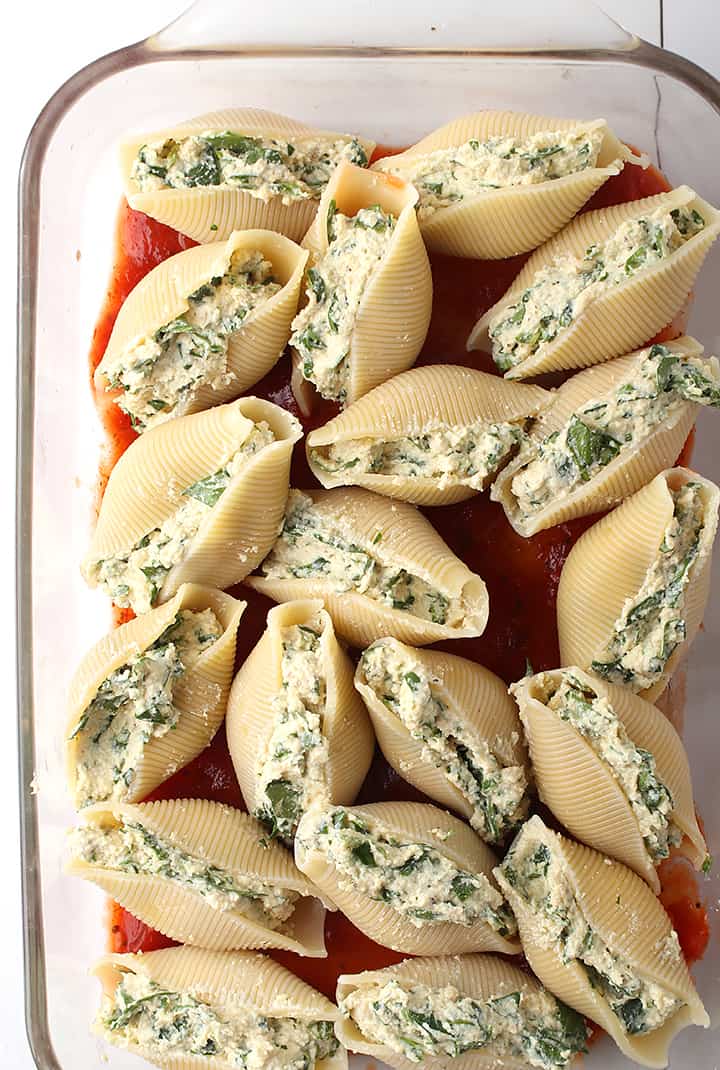 Cashew ricotta stuffed shells in casserole dish