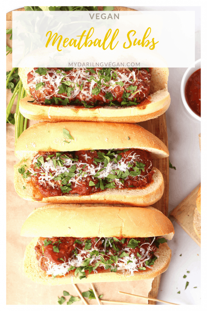 Delicious vegan meatball subs! They are made with homemade eggplant meatballs, marinara sauce, vegan parmesan cheese, and fresh parsley for the ULTIMATE vegan sandwich. 