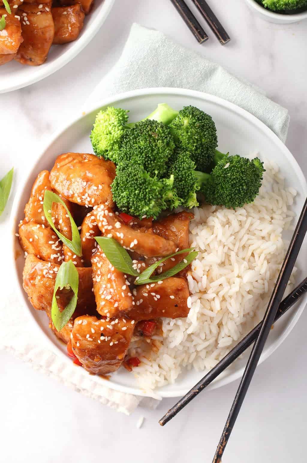 Finished dish served next to rice and steamed broccoli